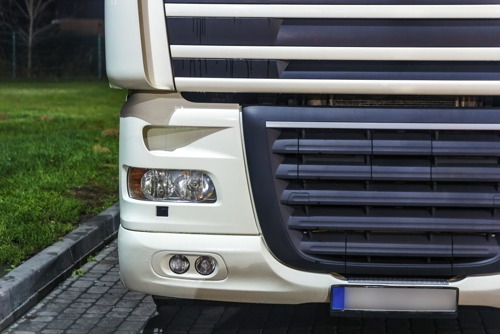 Close-up detail picture of front part of a truck